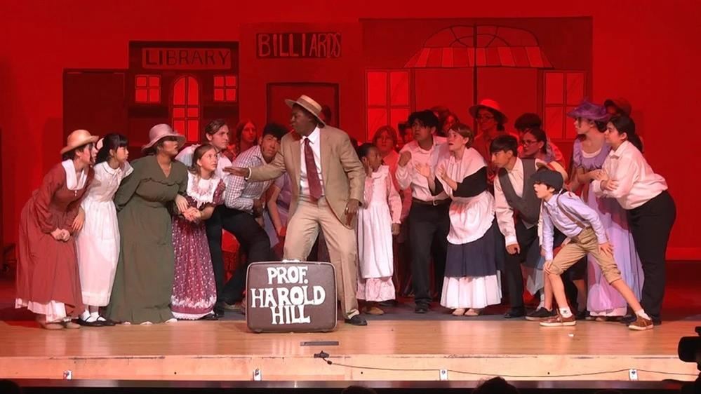 Harold Hill tells the town what kind of Trouble they are in. 